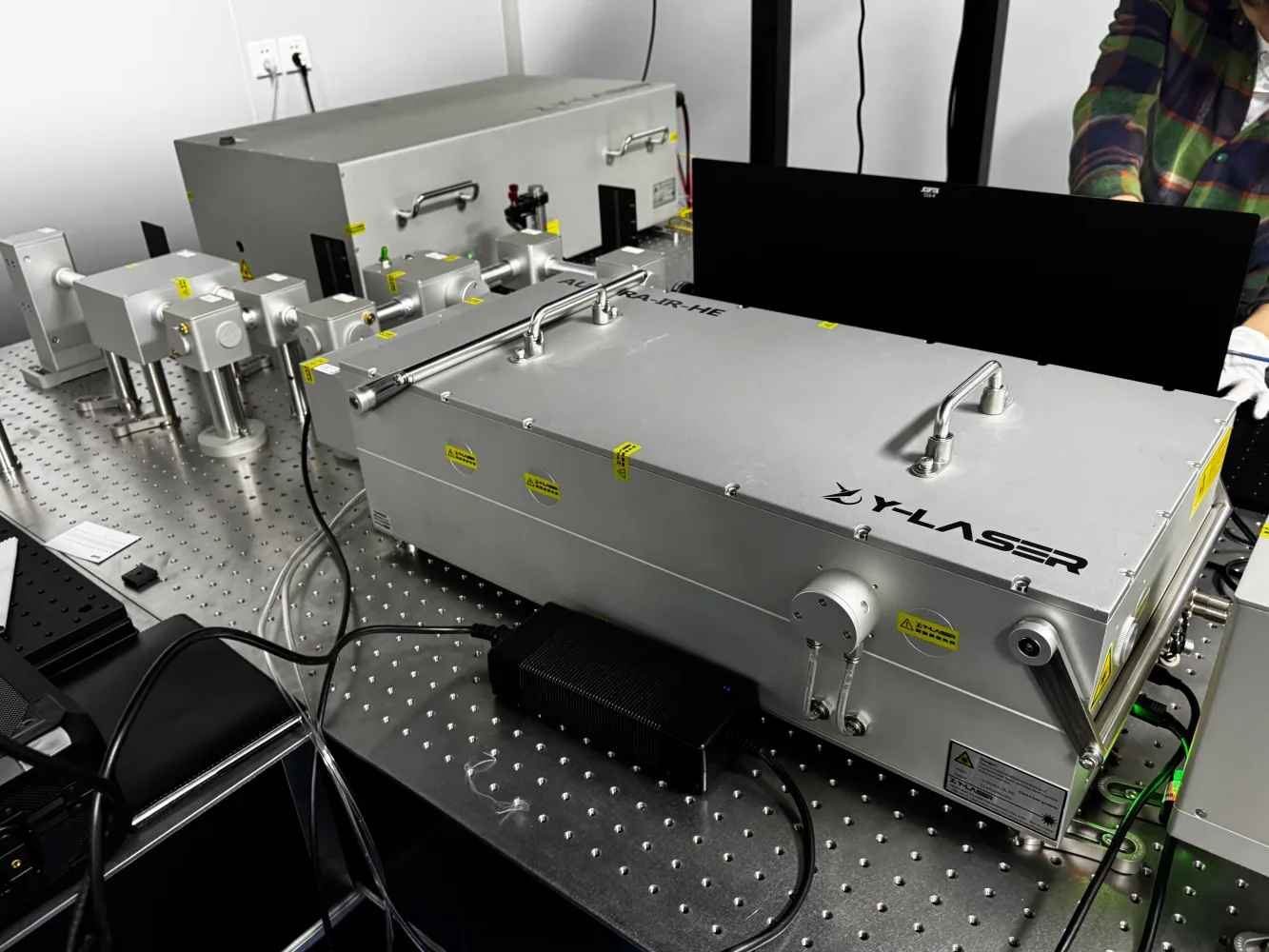 Femtosecond Lasers and Terahertz Science — Bridging Light and "Dark Light"
